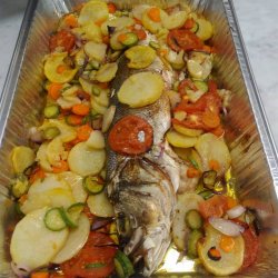 Pesce arrosto con  patate e verdure